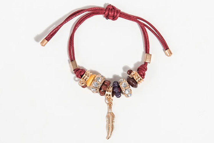 pulsera-pluma-perlas-parfois