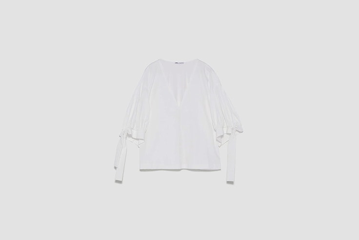 blusa abullonada zara